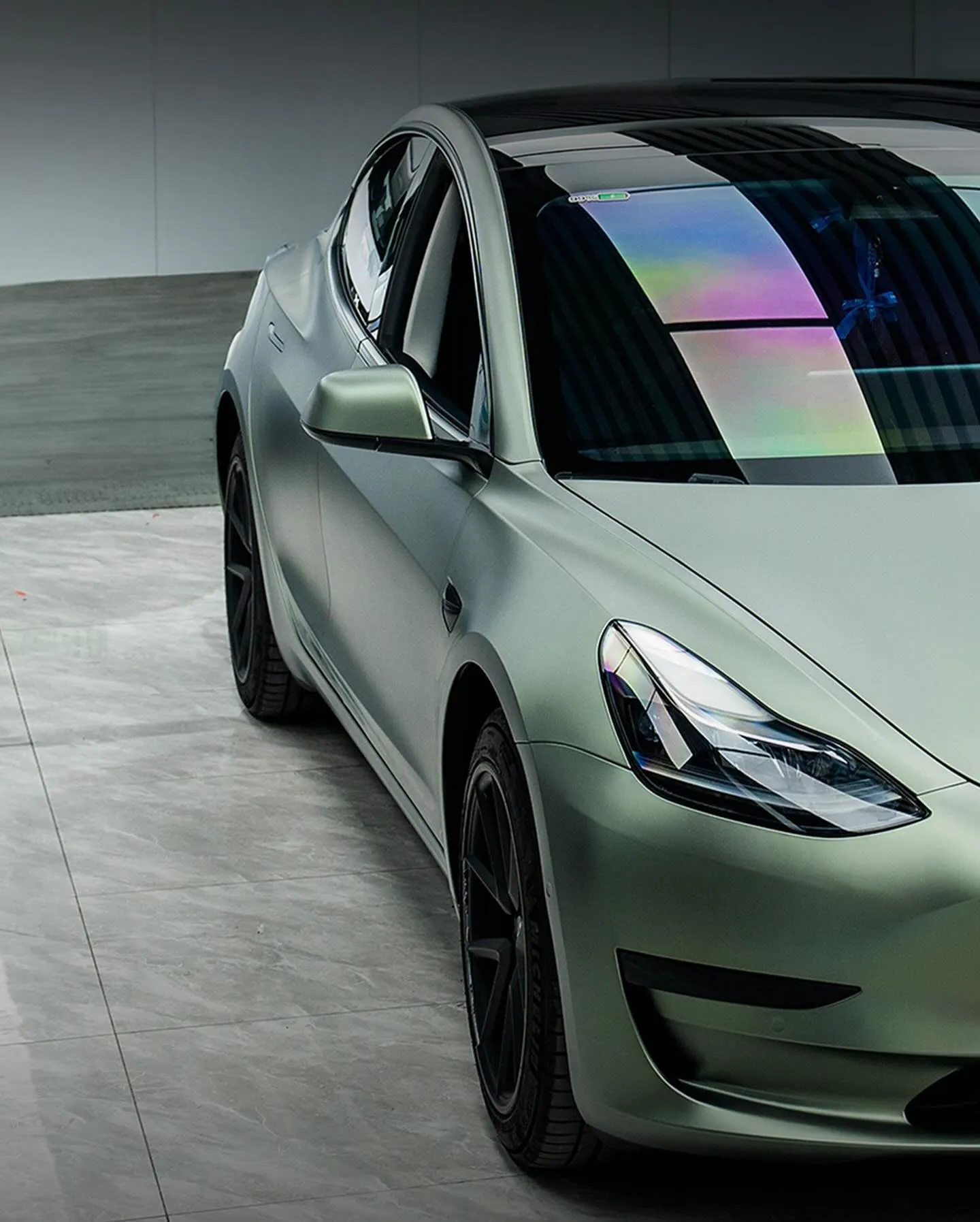 Tesla Model 3, оклеенный пленкой MC Films Matte Metallic Grey Green. View 2