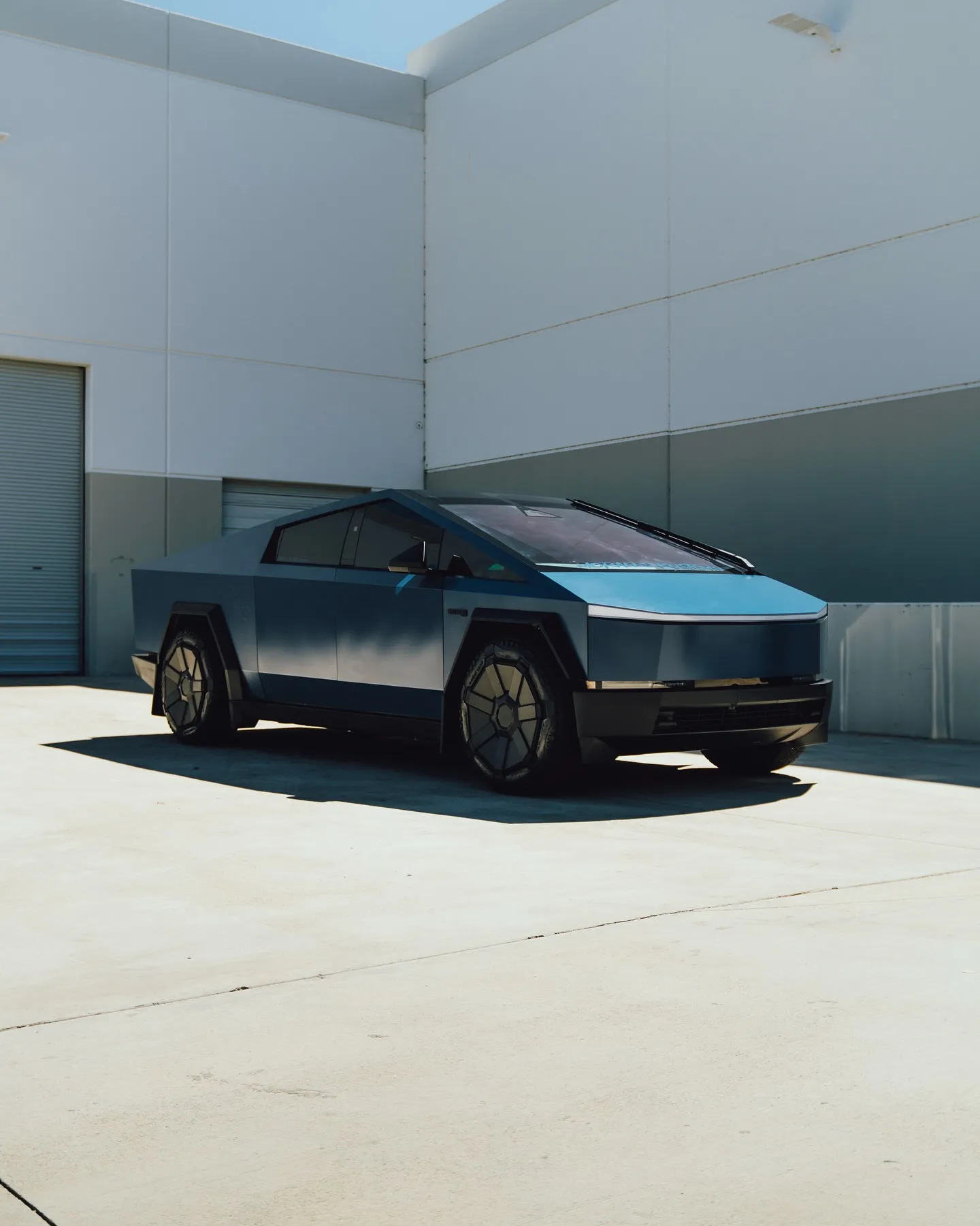 Tesla Cybertruck wrapped in Inozetek Frozen Satin Narwhal Blue film. View 1