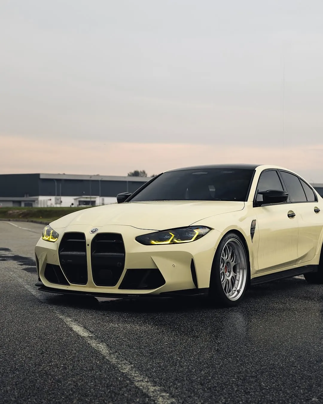 BMW G80 M3 wrapped in Inozetek Boring White color film. View 1