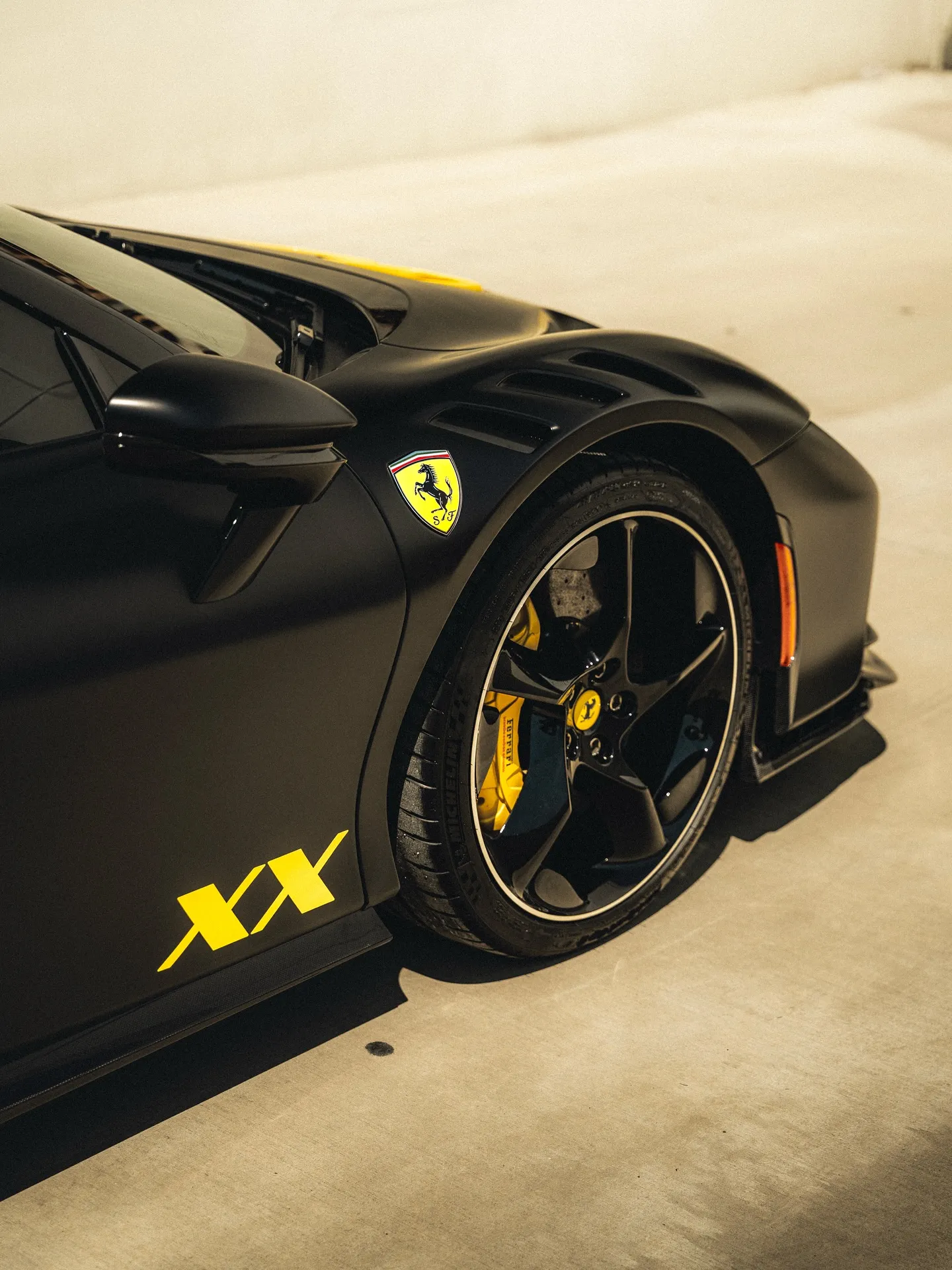 Ferrari SF90XX protected with Inozetek Dynamic PPF Satin Midnight Black. View 1