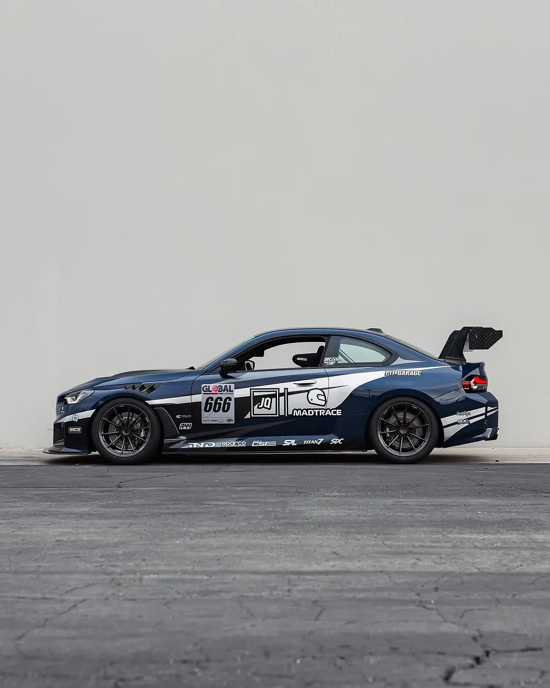 BMW G87 M2 wrapped in Inozetek Navy Blue film. View 1