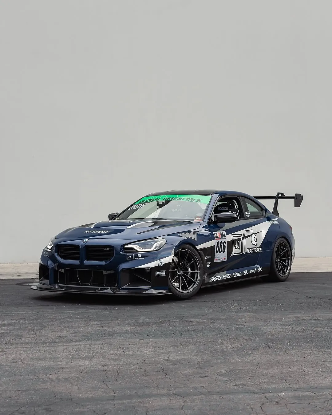 BMW G87 M2 wrapped in Inozetek Navy Blue film.