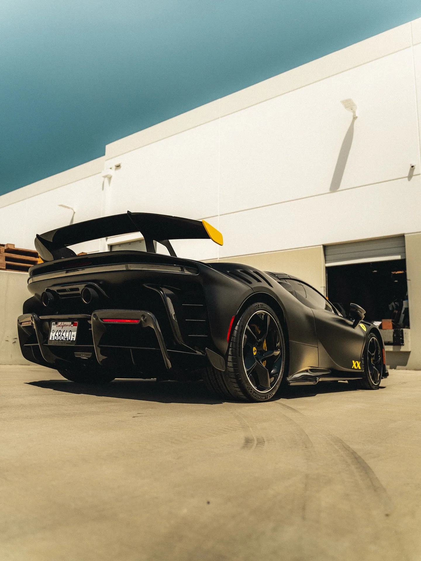 Ferrari SF90XX protected with Inozetek Dynamic PPF Satin Midnight Black. View 2