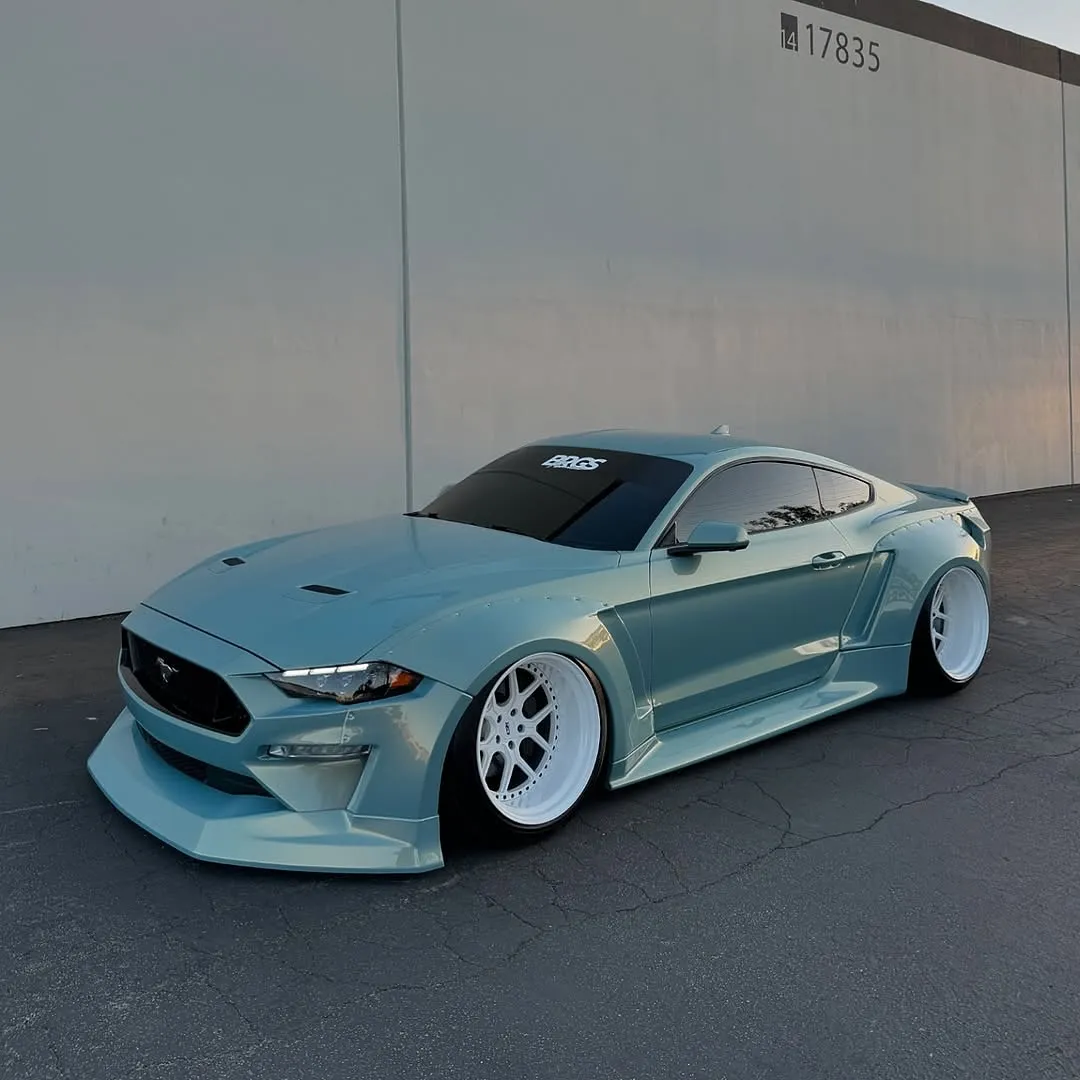 Ford Mustang wrapped in Inozetek Pearl Urban Bamboo film. View 1