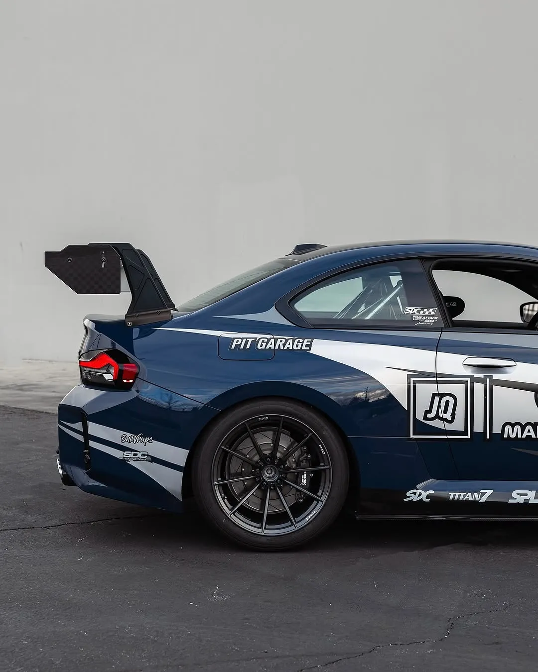 BMW G87 M2 wrapped in Inozetek Navy Blue film. View 2