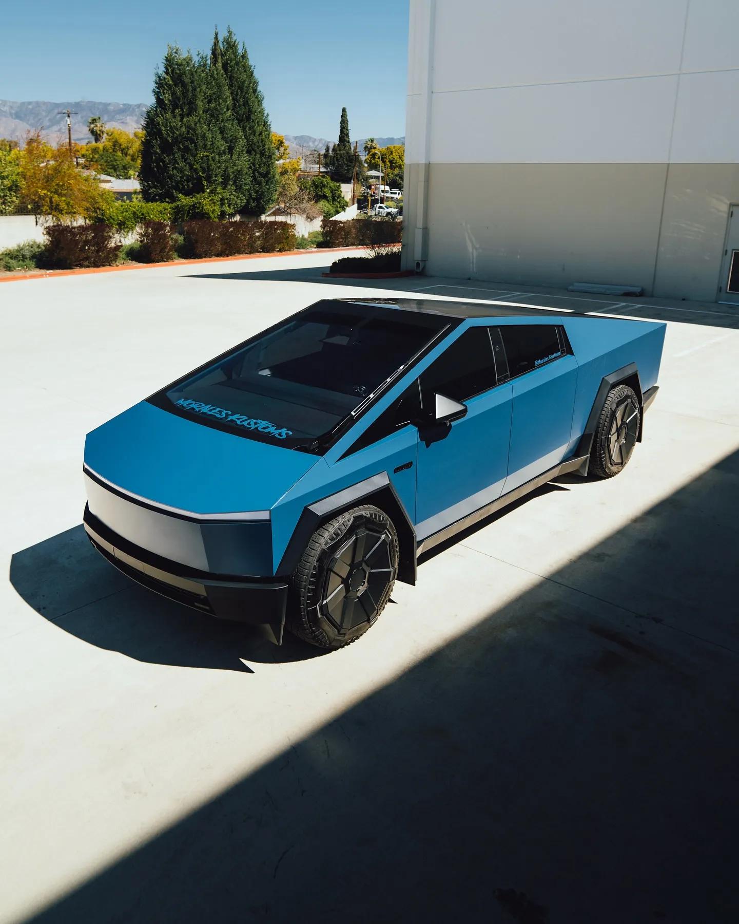 Tesla Cybertruck wrapped in Inozetek Frozen Satin Narwhal Blue film. View 2