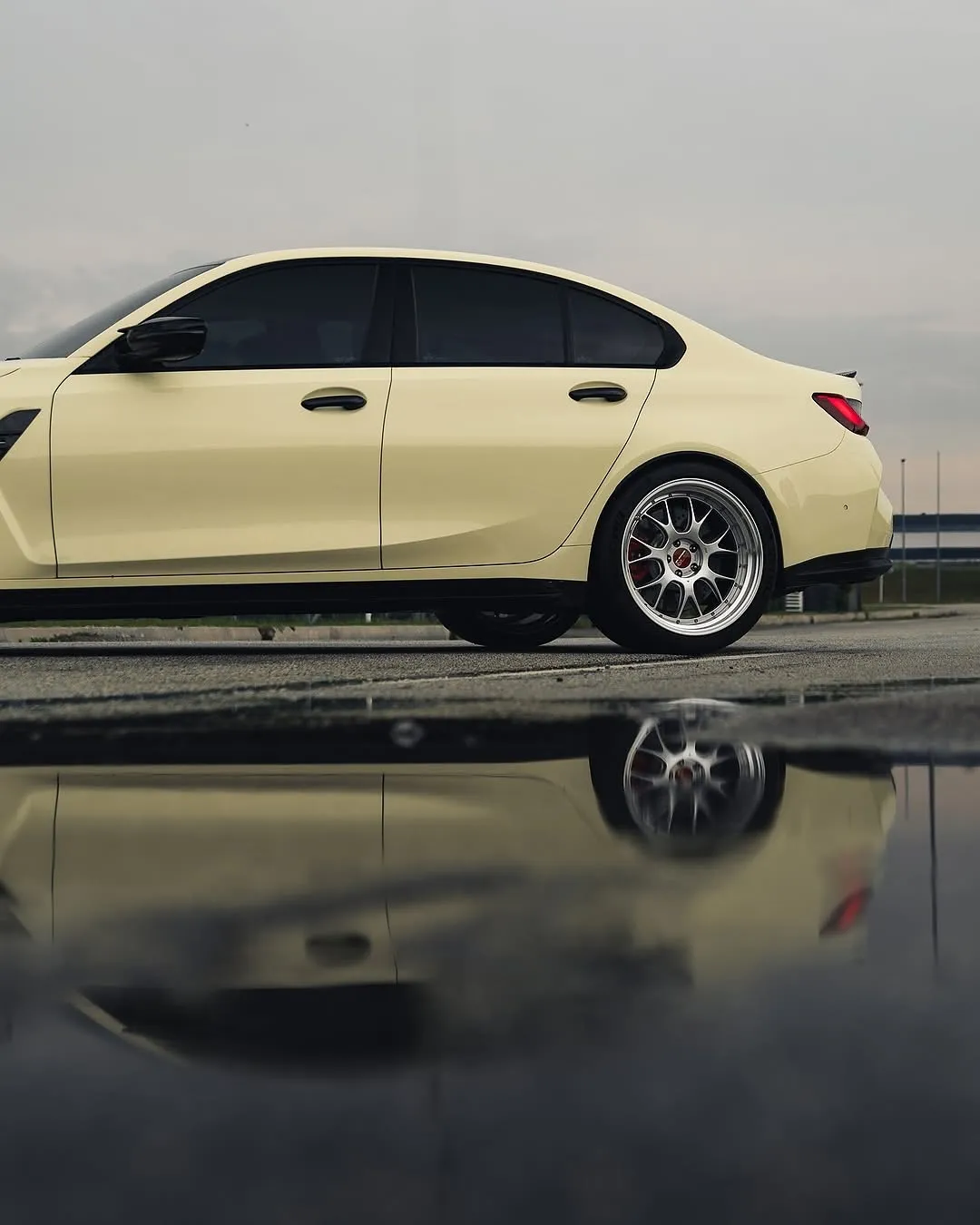 BMW G80 M3 wrapped in Inozetek Boring White color film. View 2