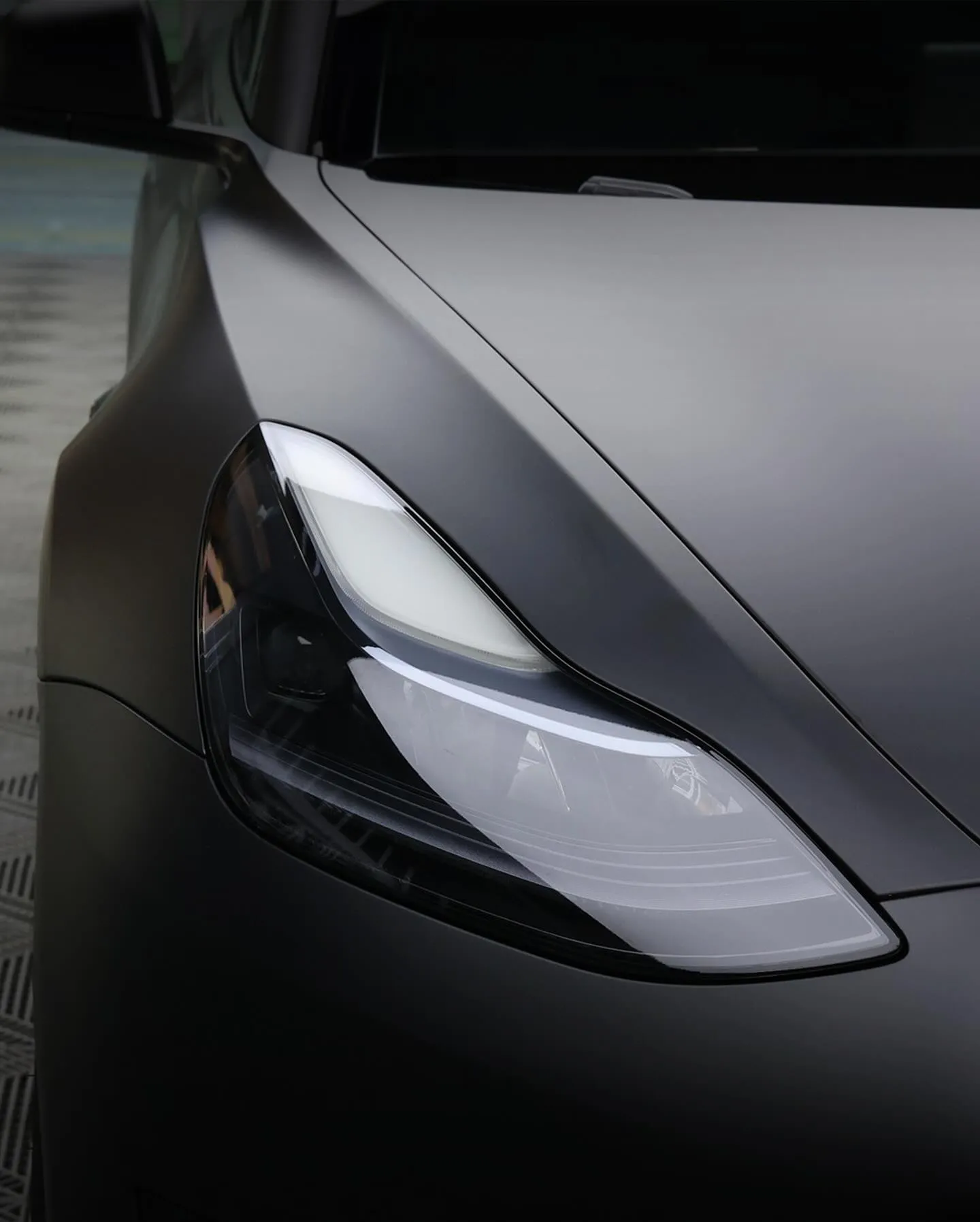 Tesla Model 3, оклеенный пленкой MC Films Super Matte Black. View 1