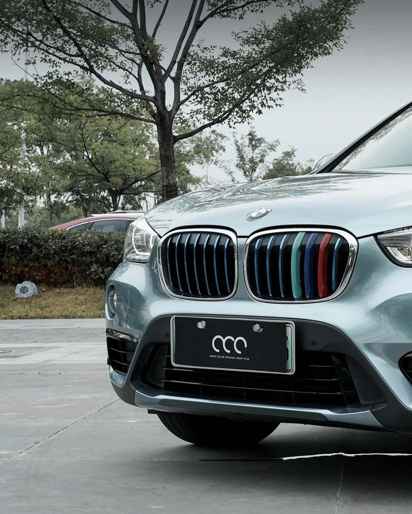 BMW X1, оклеенный пленкой MC Films Gloss Metallic Somato Blue. View 2