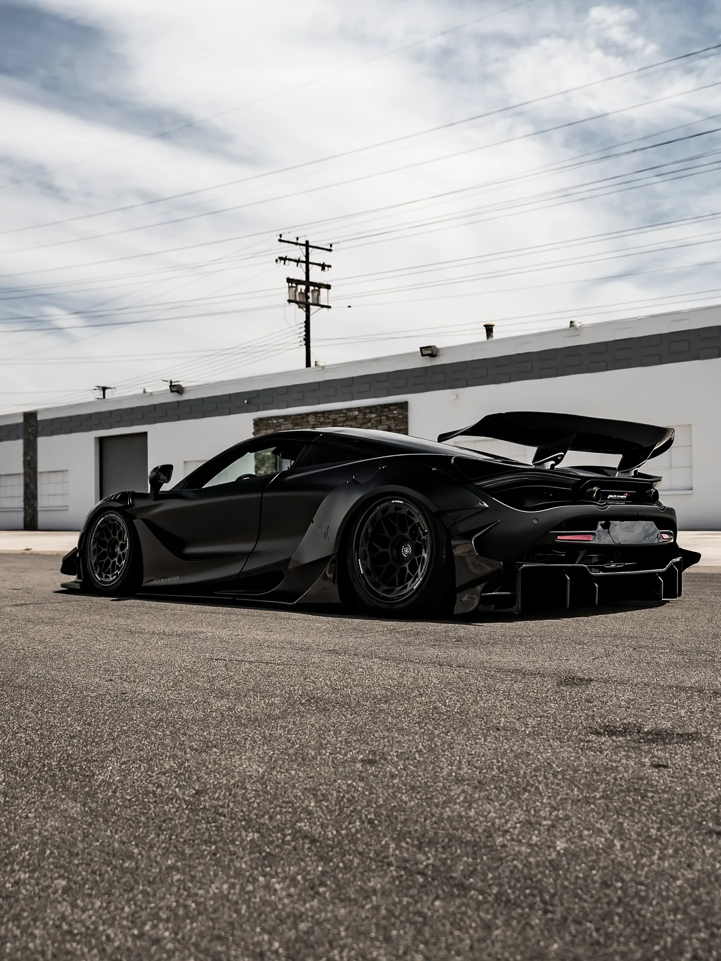 McLaren 720S wrapped in Inozetek Dynamic PPF Satin Midnight Black. View 2