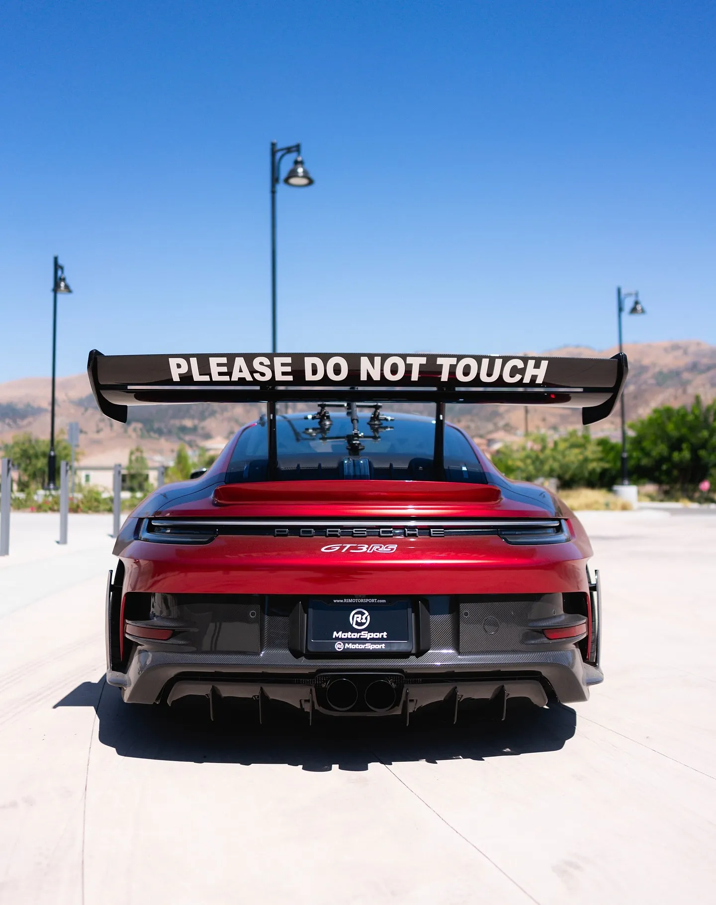 Porsche GT3RS wrapped in Inozetek Metallic Vampire Red. View 2